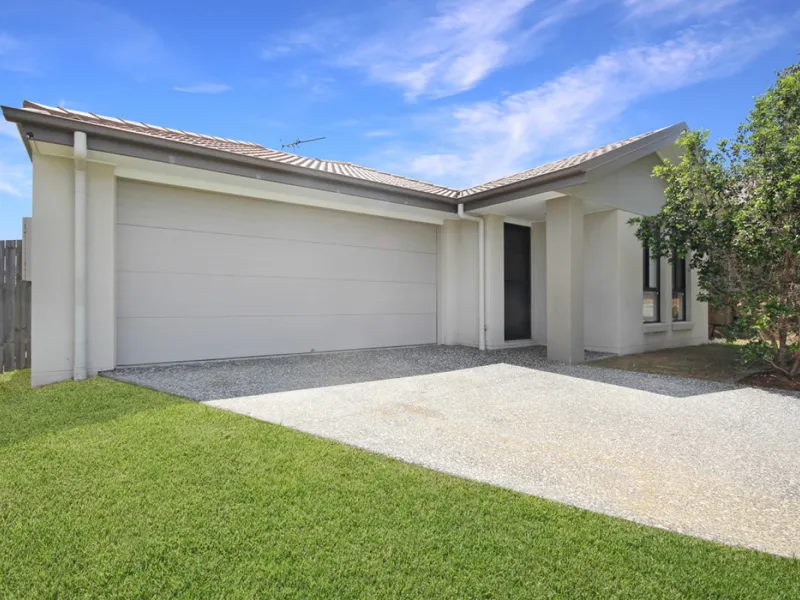 Two Living Areas + 4 bedrooms & a large yard...