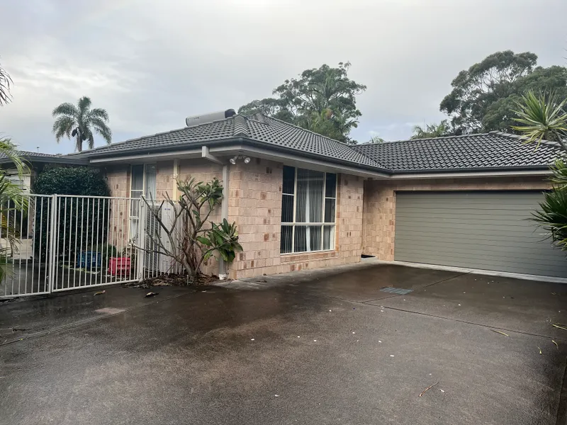 Modern three bedroom home on level block