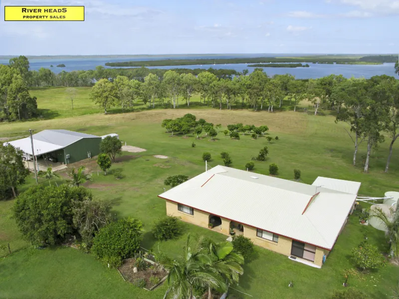 30 Waterfront Acres, Large House, Large carport!