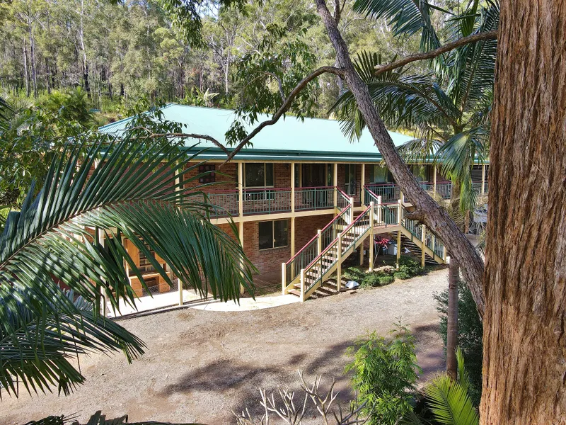 Private small acreage with lots to offer!