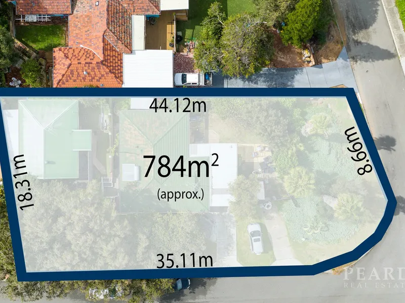 Potential to Subdivide Large Corner Block Between Beach and Bush!