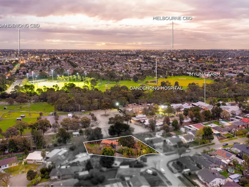 Prime development site with plans and permits approved for 7 townhomes