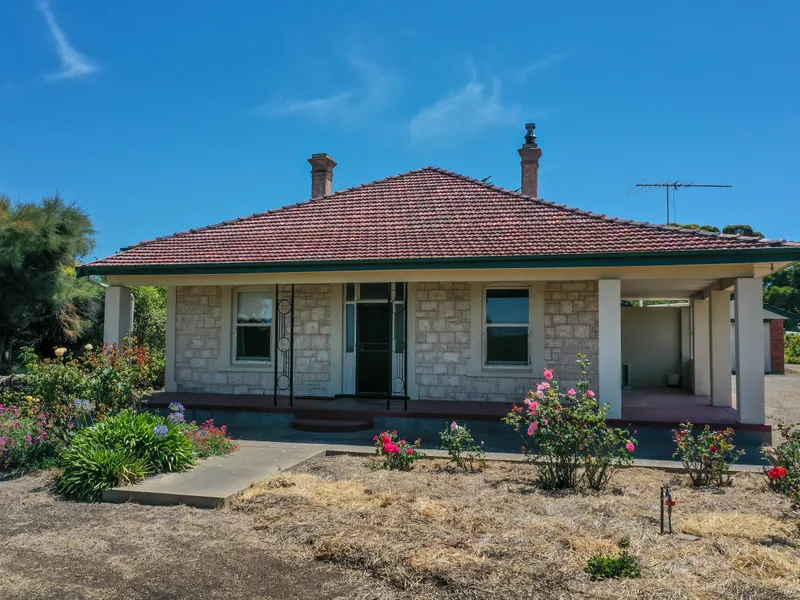 Circa 1920's Limestone Character Home, Ripe for renovation!