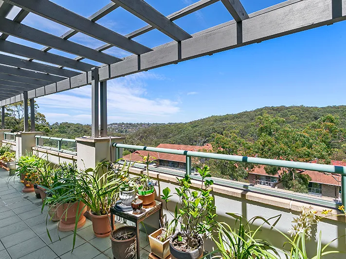 Rare 3 bedroom unit with optional garage and sweeping views of bushland from your private balcony