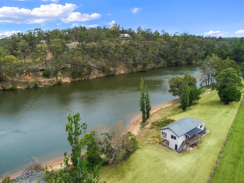 Idyllic Home with Pristine River Frontage