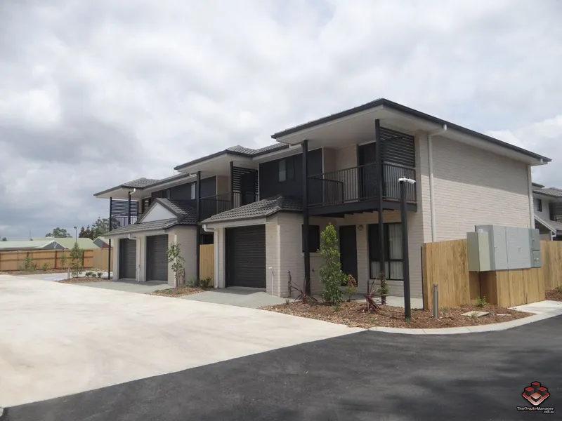 NEWLY COMPLETED TOWNHOUSES IN NICE QUITE COMMUNITY