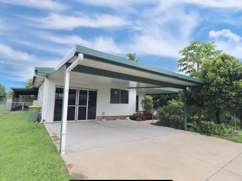 TRANQUIL LIVING IN THIS LOWSET DWELLING...