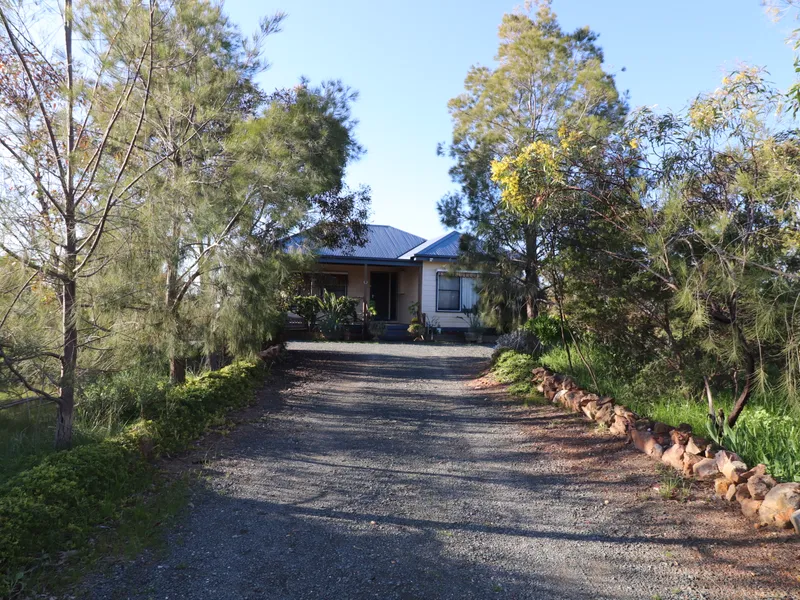 Lovely Home with 46 1/2 acres of land