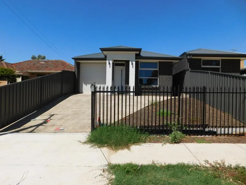 Fantastic Three Bedroom Home in Great Location! (Pets Negotiable)