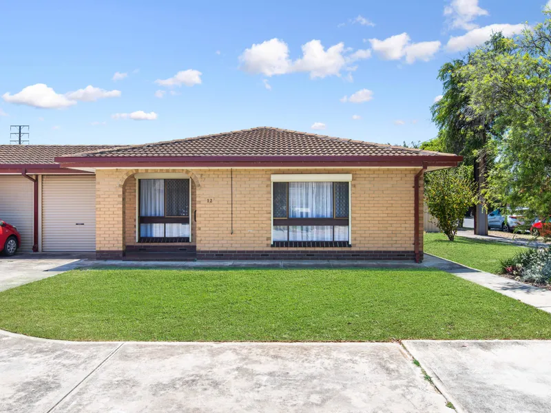 A Solid Brick, Low-Maintenance Charmer... Minutes From The Beach