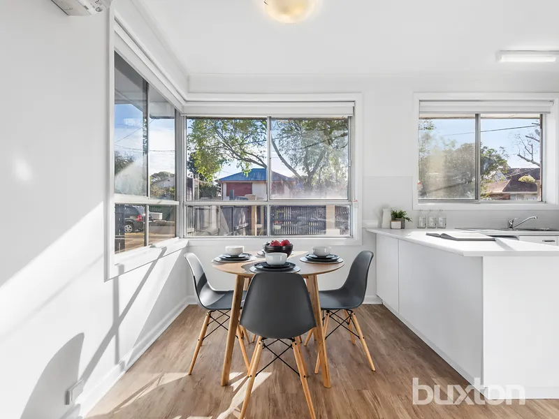 Perfectly Positioned, Stylish Low-Maintenance Living!