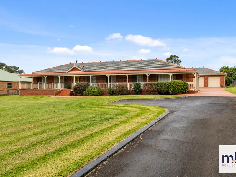 A Stunning Stately Residence on over an Acre!
