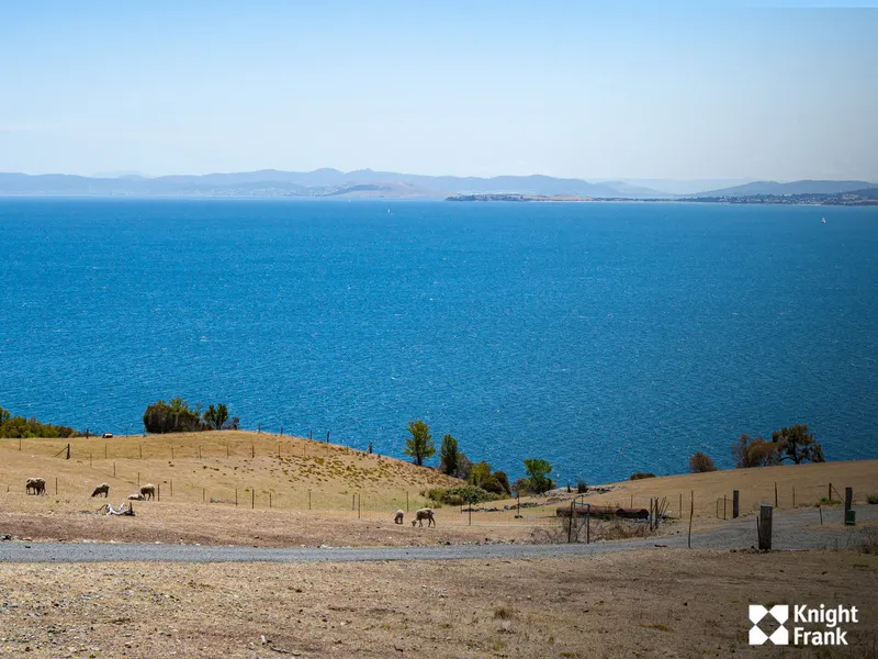 Picturesque land with 'ready to build' architecturally designed plans