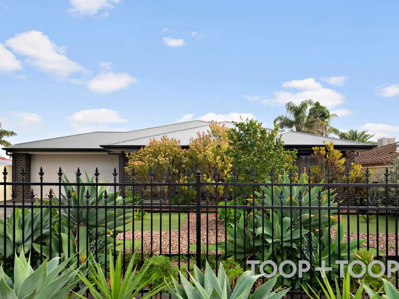 This low maintenance, modern family home has all the creature comforts you have been looking for!