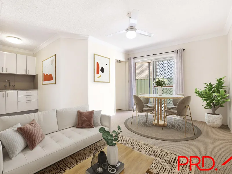 Neat 2 Bed CBD Unit with single lockup garage.