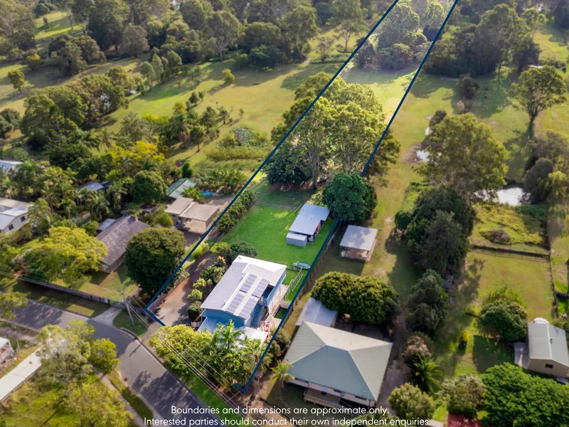 Riverside acreage with dual living and plenty of space for your toys!!!