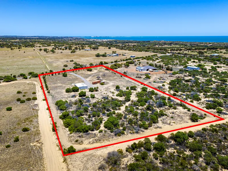 MASSIVE BLOCK AND NEAT RESIDENCE