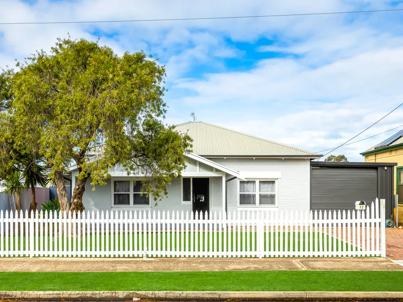 RENOVATED 1925 CHARACTER BUNGALOW IN THE HEART OF ROSEWATER!!