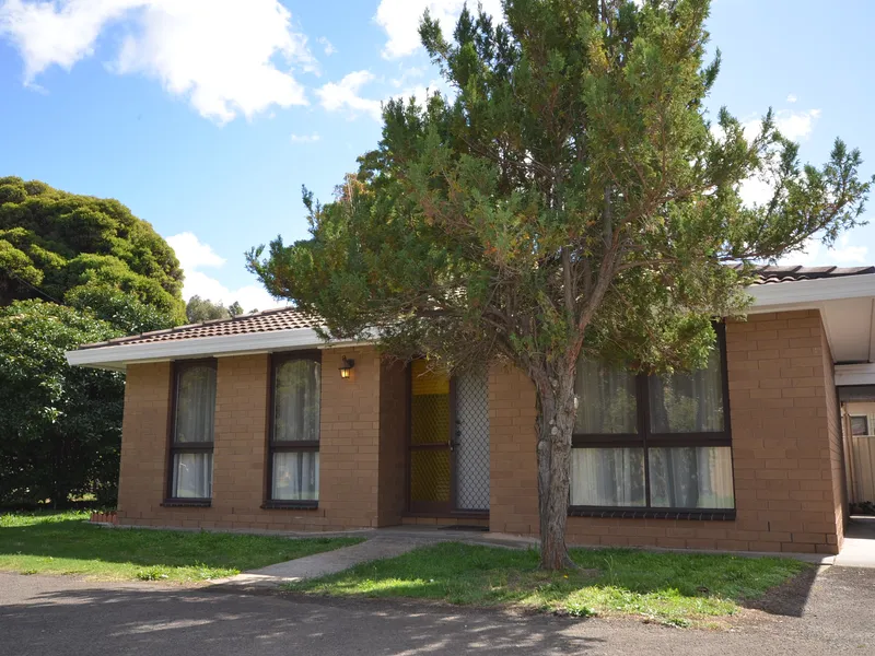 Neat as a pin in a great location!