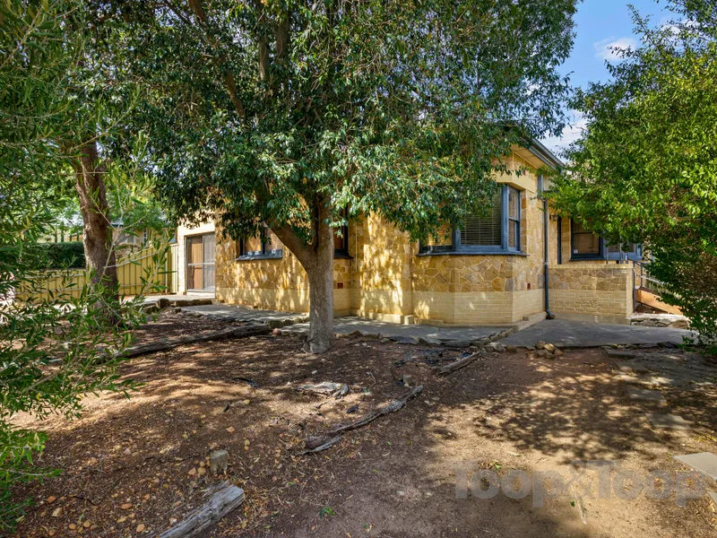 Stone-fronted home bursting with potential!
