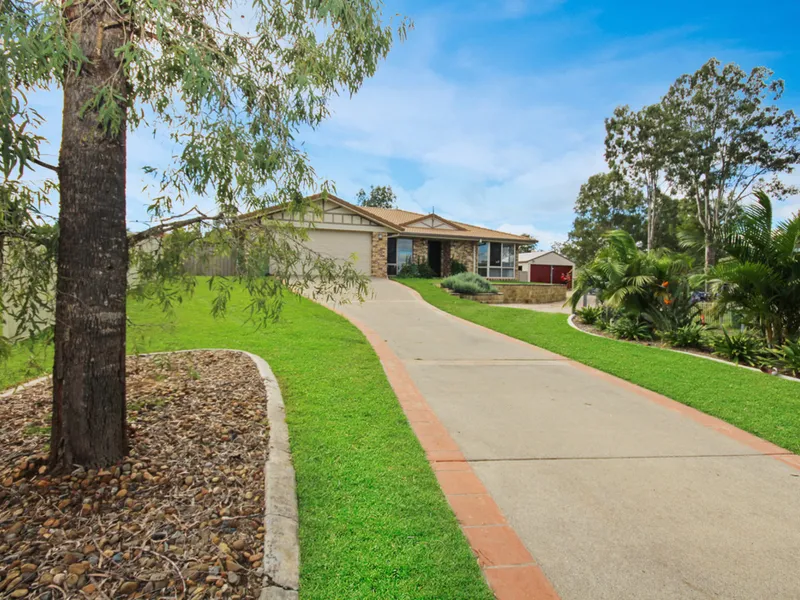 Massive Family Home Positioned on a 3097m2 block with sheds and carports..