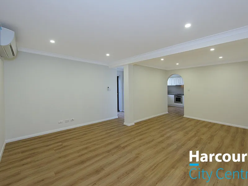 DESIRABLE RENOVATED TOWNHOUSE WITH AN AMAZING COURTYARD