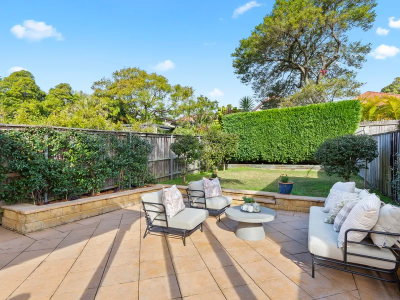 Light spacious multi-level home with large entertaining backyard