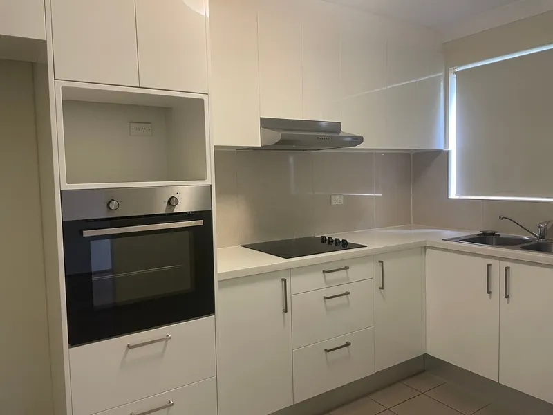 Near new kitchen, air conditioned Three Bedroom Townhouse