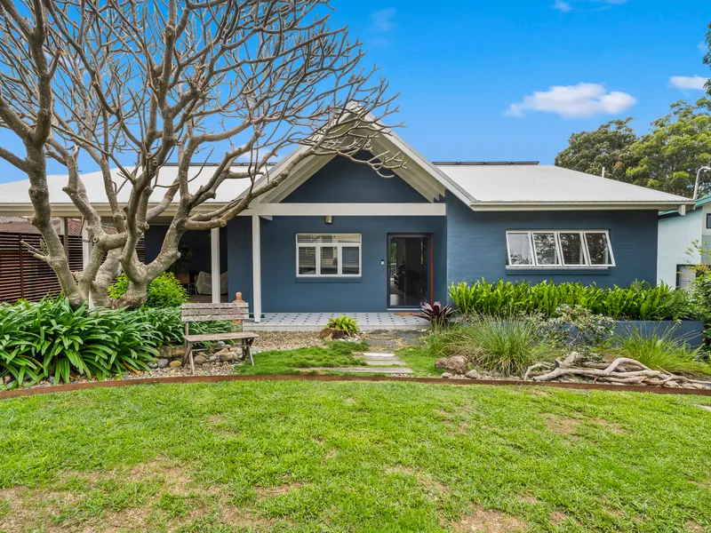 Channel Your 'Hamptons' Style With This Captivating Beachside Home!