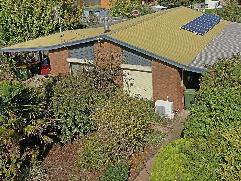 Brick home, close to schools and golf course