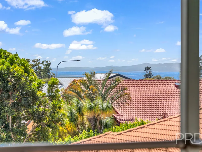 STRADBROKE ISLAND & WATER VIEWS / 2 LEVEL, EAST FACING, FAMILY HOME / BOAT & CARAVAN PARKING/ ROOM FOR A POOL / FULL SIDE ACCESS