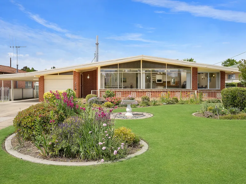 Retro Charm meets Modern Convenience in this Beautifully Presented 1960s Home