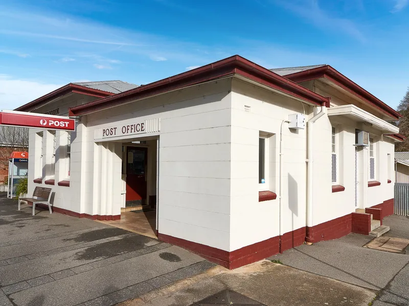 Woodside Post Office Circa 1942 Iconic Building High exposure Site, Good secure rent return Great Investment in Popular Hills Township.