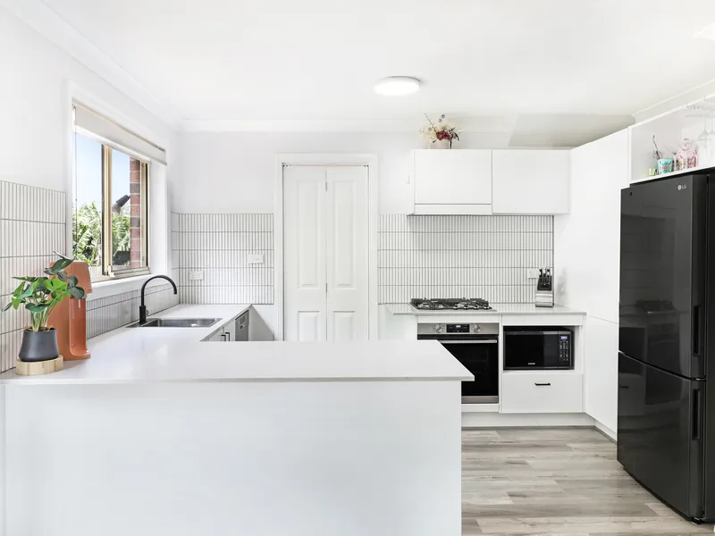 TASTEFULLY RENOVATED TOWNHOUSE