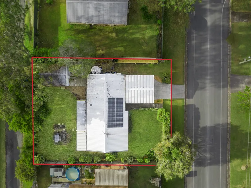 Airy Vaulted Ceilings and Rear Vehicle Access Plus A Shed