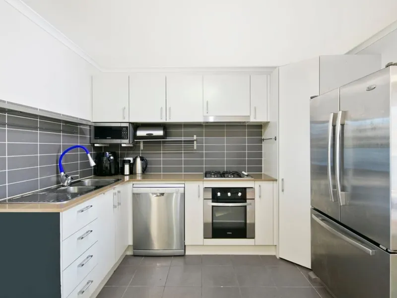 Lovely 3 bedroom ensuite apartment with garage, opposite tram line