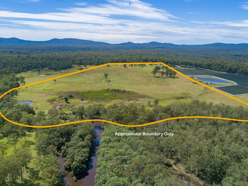 Picturesque level acreage set over 100 acres...
