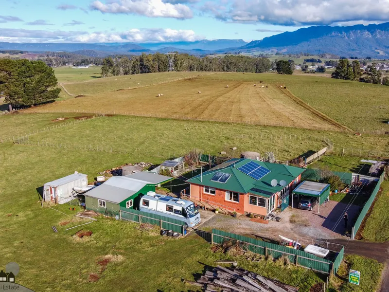 11 Acres and a Family Home with Stunning Views
