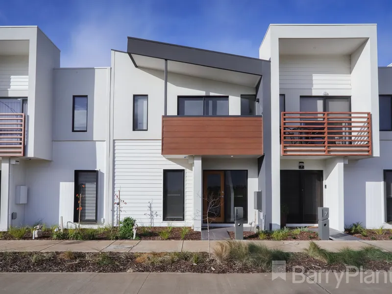 A winning move in every respect, this brand new townhouse is contemporary living at its finest