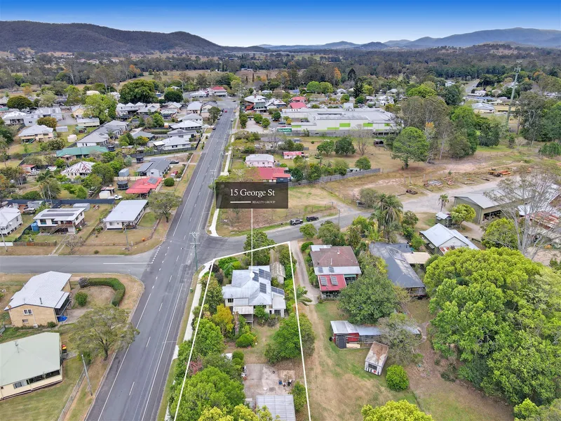Unleash Your Vision: Township Industry Development Block with a Historic Queensland-style Home
