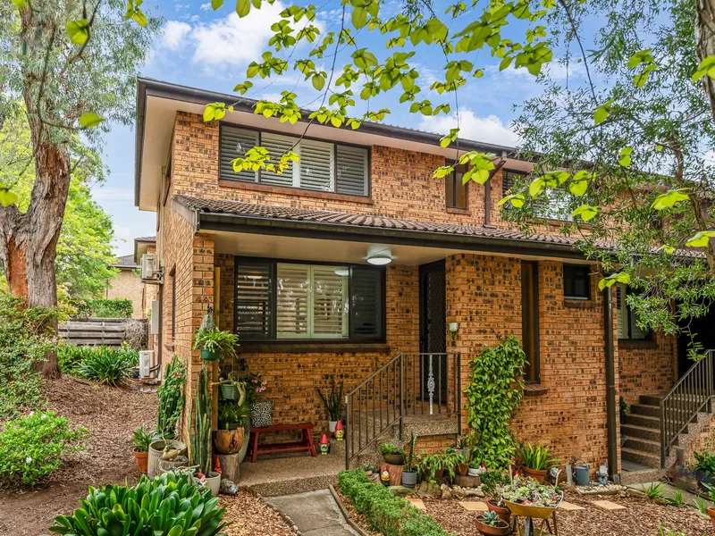 Convenient street front full brick townhouse with leafy outlook