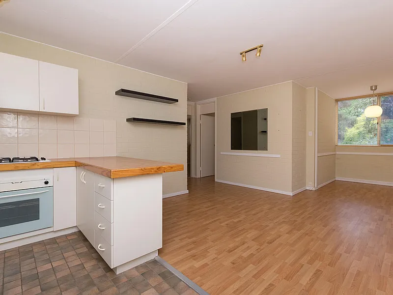 A Low Maintenance Lifestyle Overlooking Parklands Awaits!