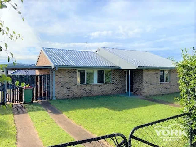 Family Brick Home in close proximity to Hospital and Local Schools