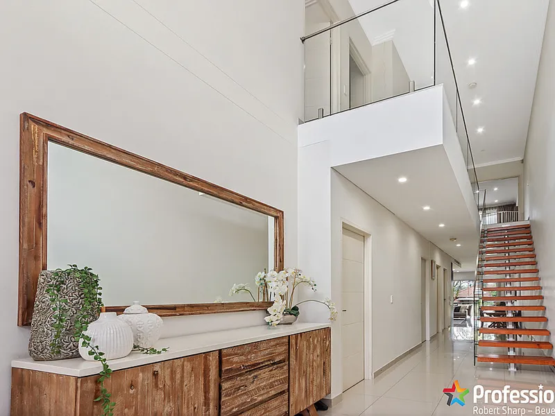Super Spacious Architecturally Designed Full Brick Duplex.