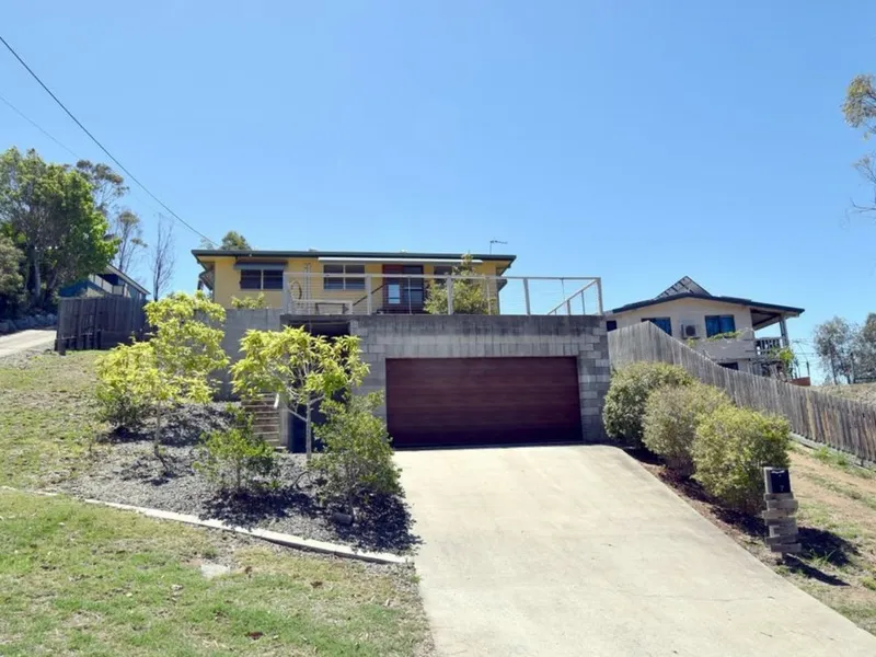 THREE-BEDROOM HOME WITH LARGE DOWNSTAIRS LIVING