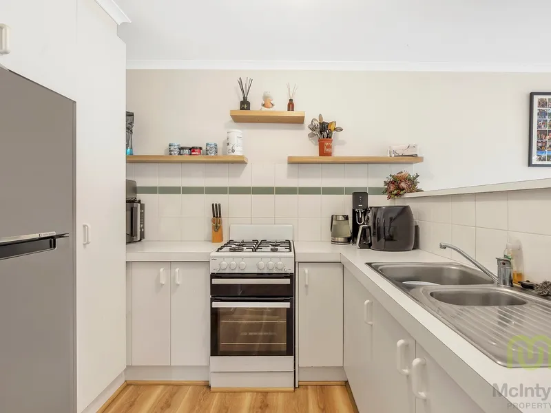Neat Townhouse With Two Courtyards!