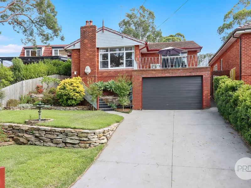 RENOVATED FULL BRICK RESIDENCE IN TIGHTLY HELD LOCALE