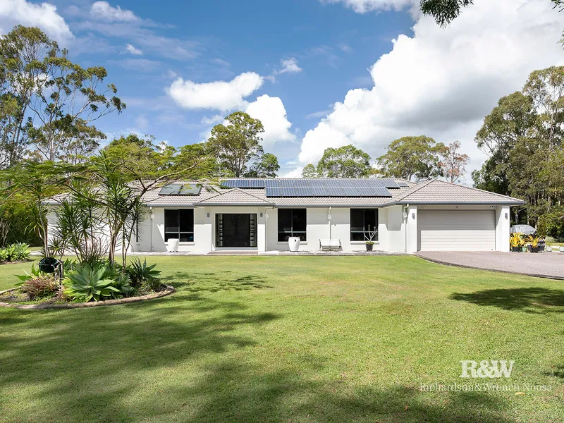 1.5 Acre Turn-Key Haven Offering Laid-Back Living