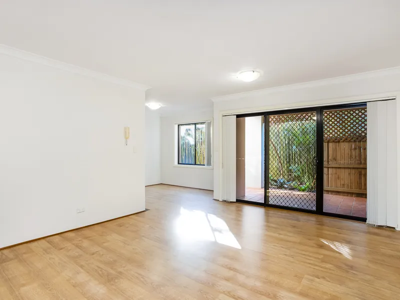 Spacious two bedroom apartment with sunny courtyard in security block.