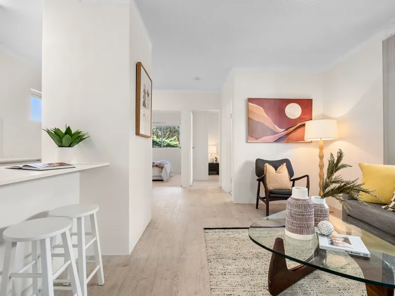 Renovated and close to shops!